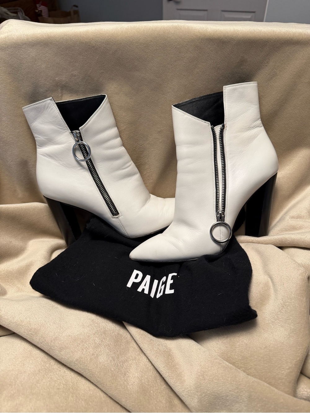 PAIGE White Leather “Katie” Pointed Ankle Zip Booties with Ring Pull